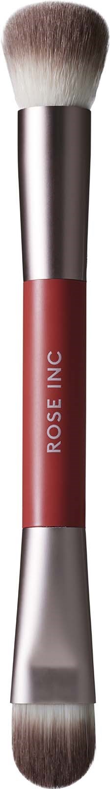 Ein doppelseitiger Make-up-Pinsel mit weichen Borsten, rosa Griff und 'ROSE INC' Schriftzug.