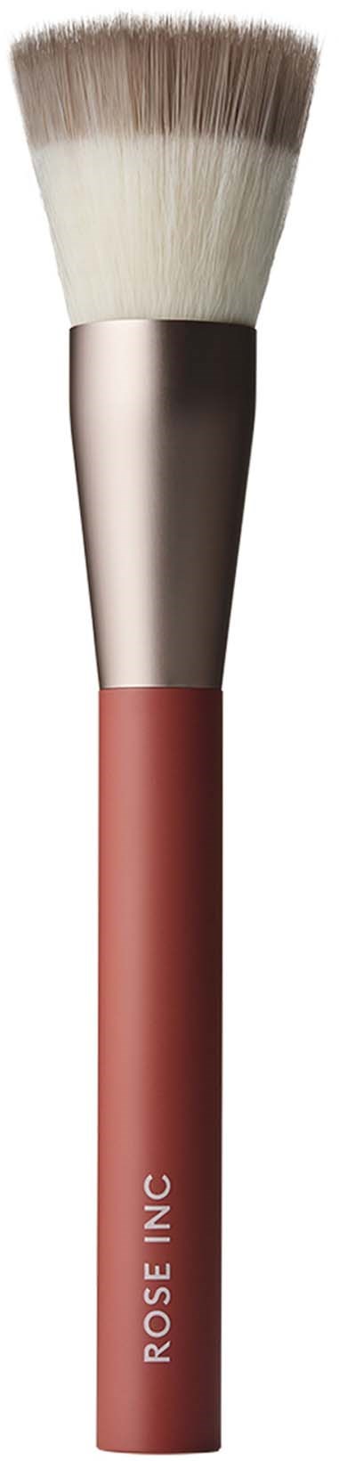 A makeup brush with a pink handle, silver metal part, and soft white and brown bristles.