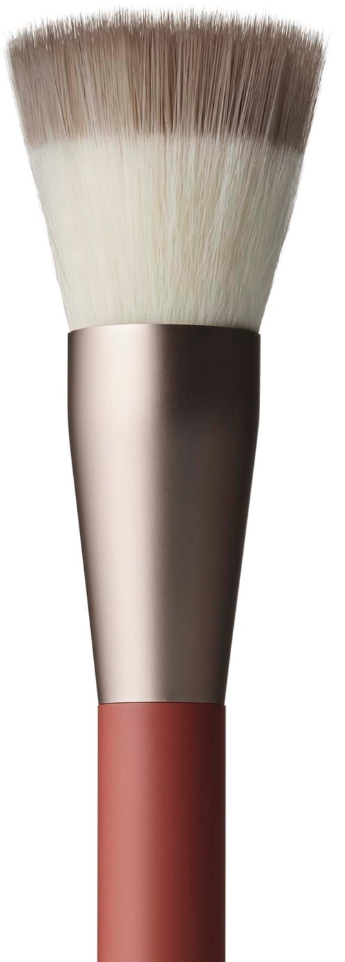 A makeup brush with white and brown bristles and a metallic pink and beige handle.