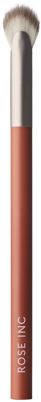 A makeup brush with a brown handle and soft bristles, labeled 'ROSE INC' on the handle.