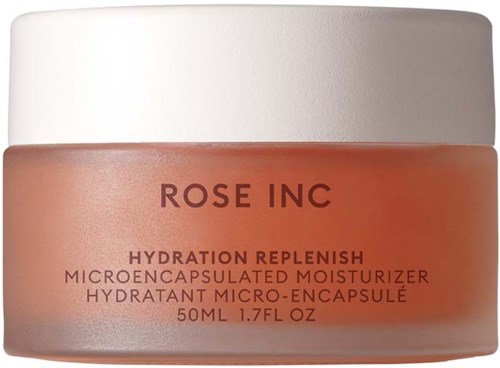 Mały słoik z nawilżającym kremem z różą, biały wieczko, oznaczony "Hydration Replenish" i 50ml pojemności.