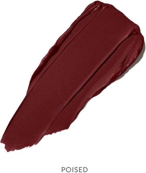 A streak of dark red lipstick with a creamy texture and smooth finish.