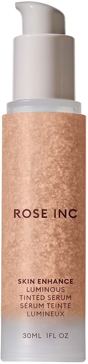 A skincare bottle labeled 'ROSE INC' with a pump, containing a luminous tinted serum.