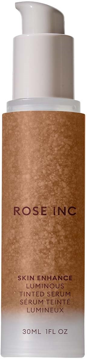 A brown bottle with a white pump, labeled Rose Inc, containing skin serum for enhancing skin's glow.