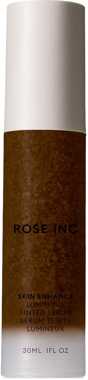 A brown and white bottle with text, likely a cosmetic product for skin enhancement.