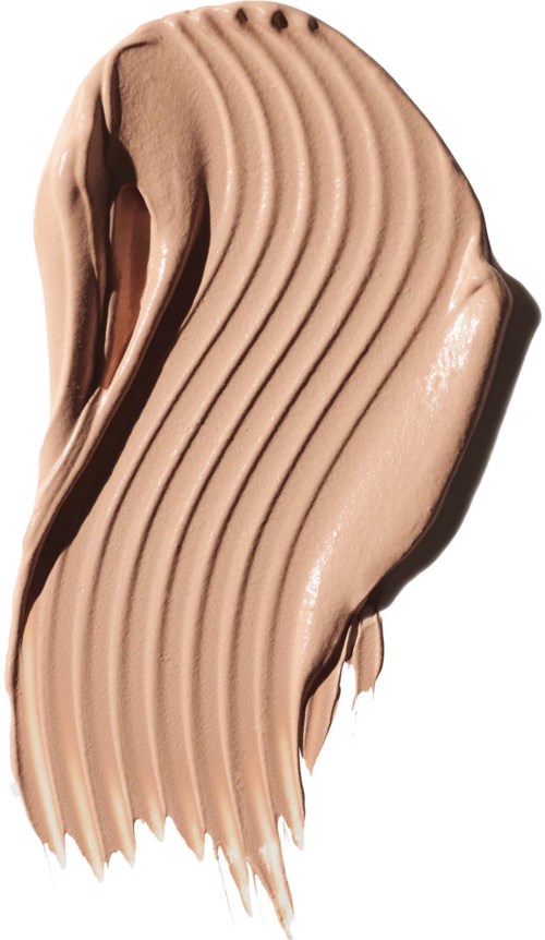 A streak of beige-colored cream with ridges, appears smooth and creamy.