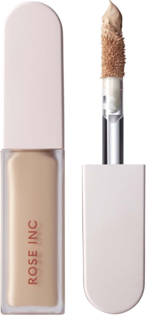 A beige liquid concealer in a white tube, with an attached wand applicator.