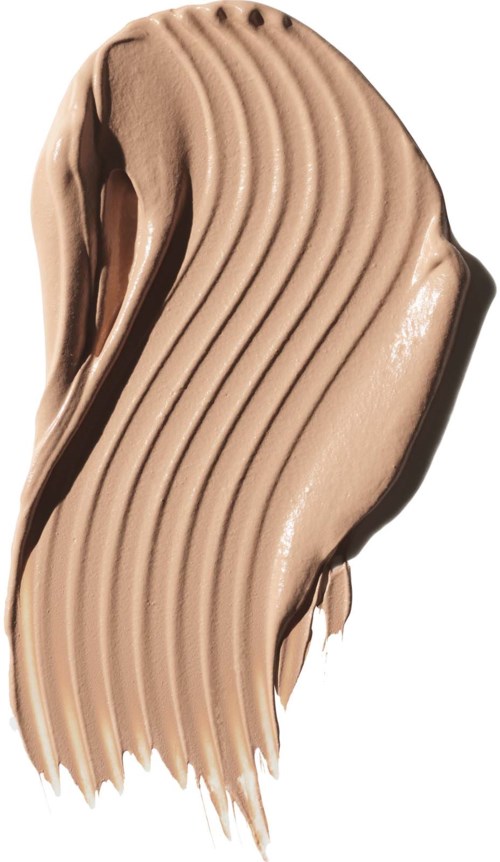 A streak of beige liquid makeup with ridges and curves, showing a smooth, creamy texture.