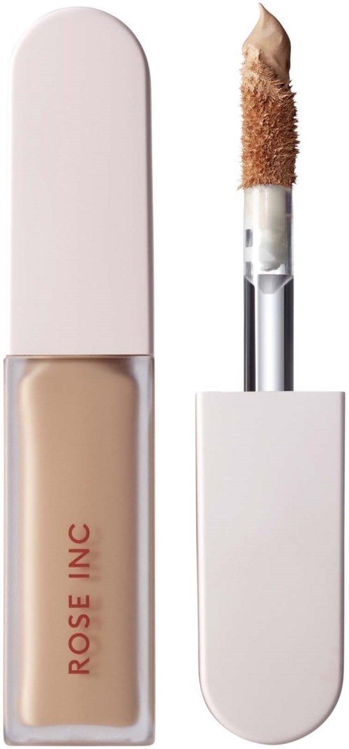 A liquid concealer in a white and transparent container with an applicator stick.