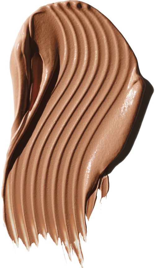 Swirled chocolate spread with ridges and a spoon shape. Smooth, shiny, and creamy texture.