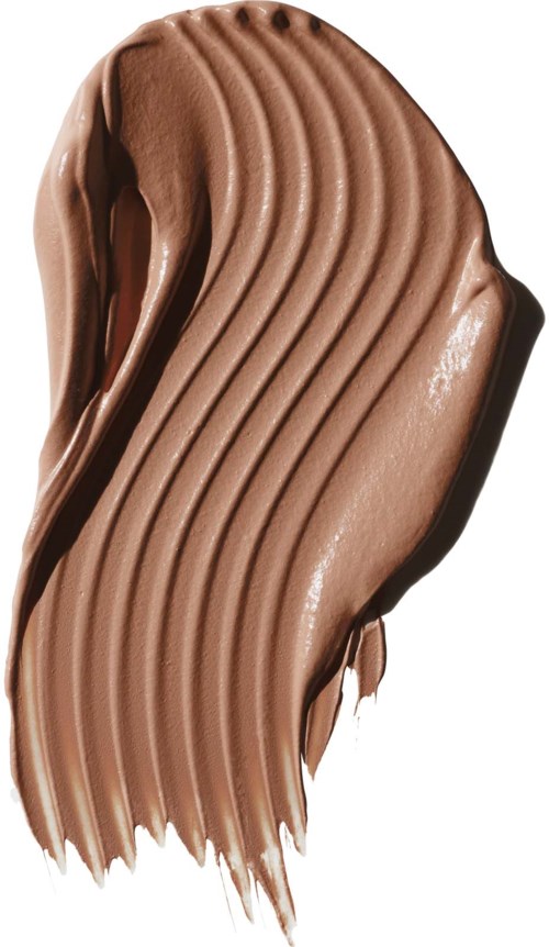 A smear of smooth, brown chocolate with curved lines on a white background.