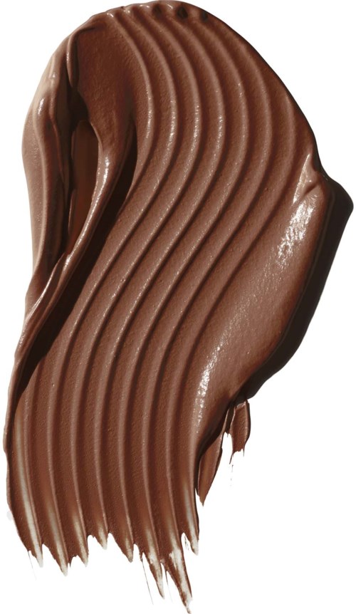 A smooth, curved swirl of milk chocolate with ridges, showing a shiny, creamy texture.