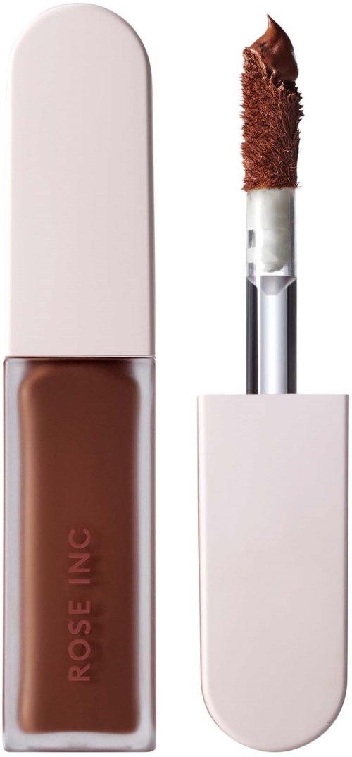 A brown lip gloss or lipstick with an applicator stick, in a white case.