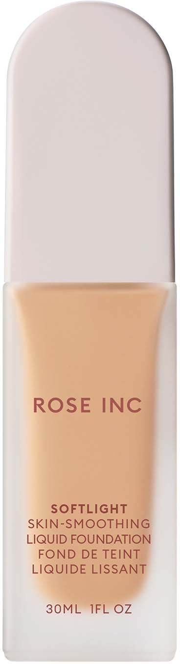 A foundation bottle labeled 'Rose Inc' with light-colored liquid inside, in a sleek, white tube with a rounded cap.