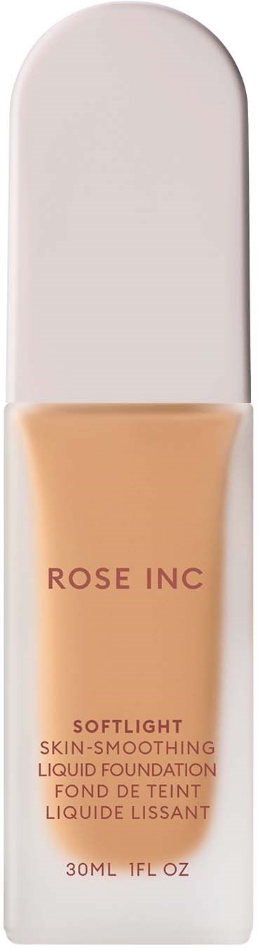 A cosmetic foundation bottle labeled 'Rose Inc' with soft color and simple design.