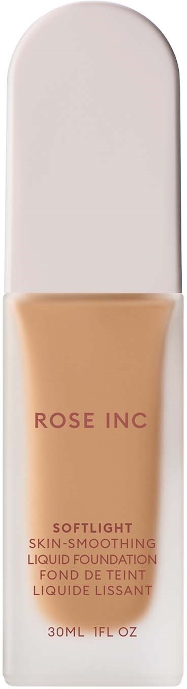 A bottle of liquid foundation with a white cap and label that reads "ROSE INC SOFTLIGHT SKIN-SMOOTHING LIQUID FOUNDATION."