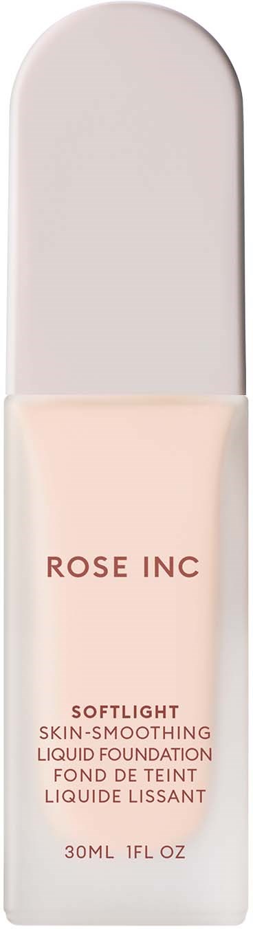 A bottle of rose-colored liquid foundation with a white cap, labeled 'ROSE INC SOFTLIGHT SKIN-SMOOTHING LIQUID FOUNDATION'.