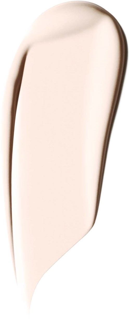 A close-up of a pale, creamy-colored liquid in a drop shape on a dark background.