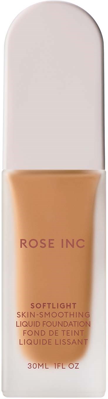 A bottle of liquid foundation labeled Rose Inc, soft light, 30ml, with a beige color. The bottle has a white cap.