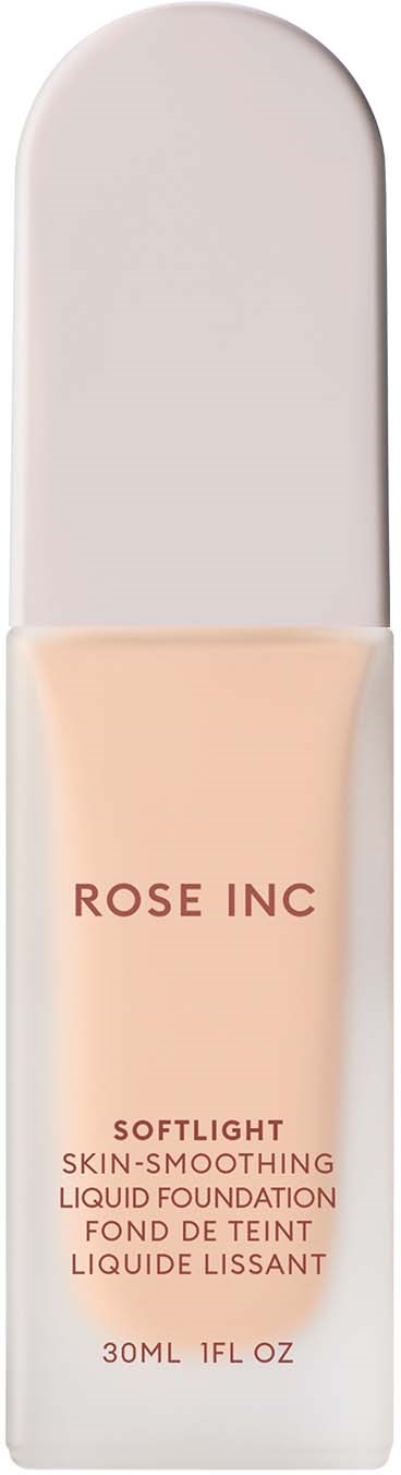 A bottle of liquid foundation with a white cap and a beige bottom. The label says "Rose Inc" and "Softlight".