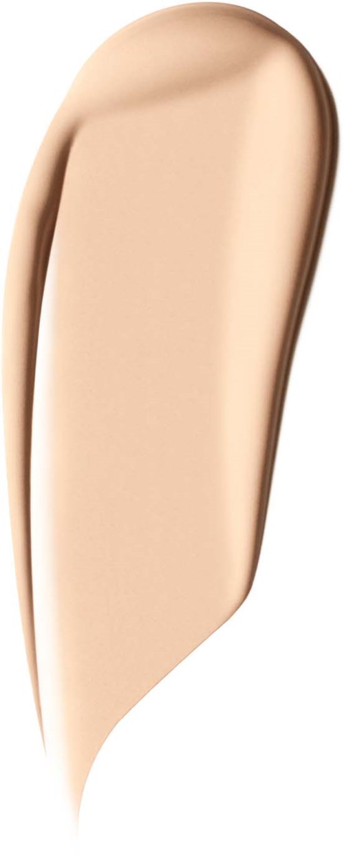 A beige liquid foundation smear with a smooth texture and curved shape on a white background.