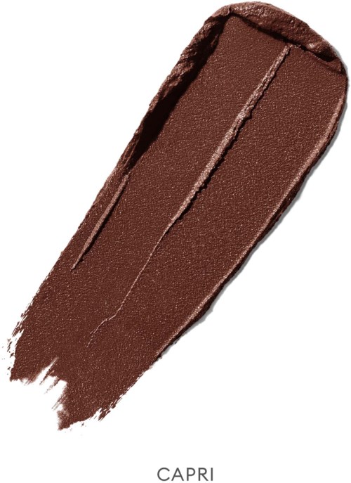 A brown makeup product, likely eyeshadow or eyebrow filler, with a panel of the same color and a label "CAPRI".