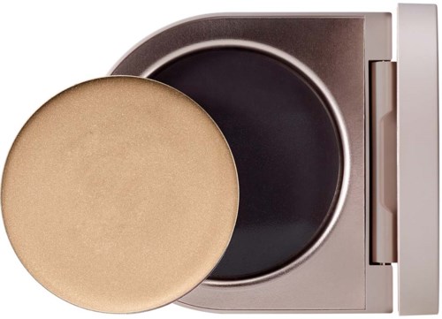 A compact powder case with a gold puff resting on the open container.
