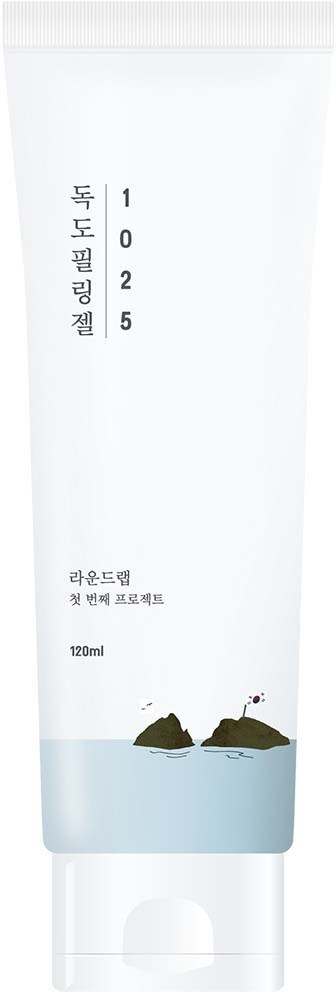 Eine weiße Tube mit koreanischem Text und einer kleinen Illustration von Steinen und Wasser am unteren Ende.