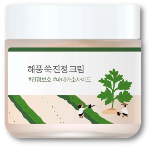 A jar with Korean text, green plants, and two people watering plants in a garden. It appears to be a cream or skincare product.