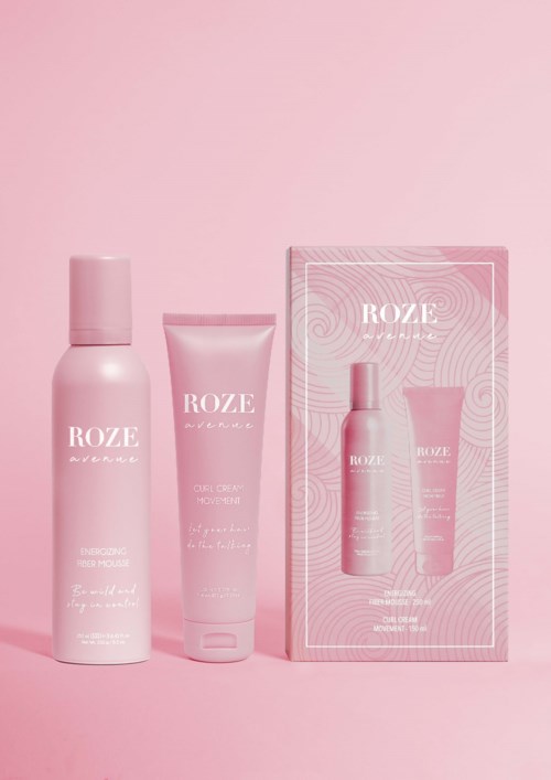 Three pink grooming products and a box, arranged on pink background, labeled with the brand 'ROZE'.