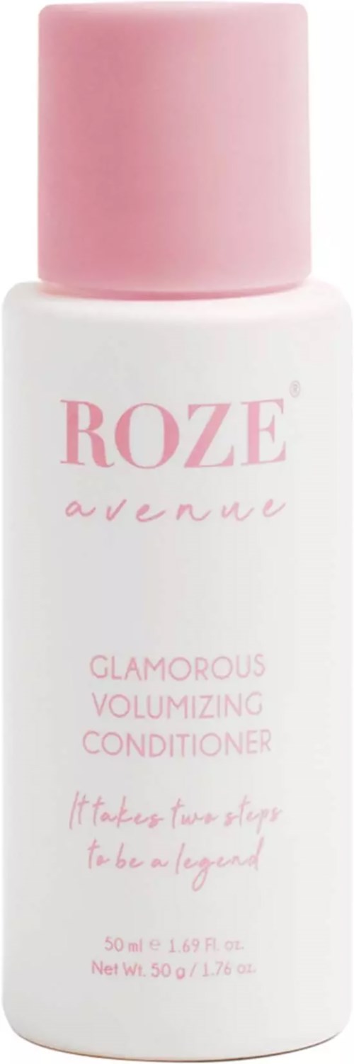 Eine weiße Flasche mit rosa Deckel, beschriftet mit 'ROZE avenue' und 'Glamorous Volumizing Conditioner'.