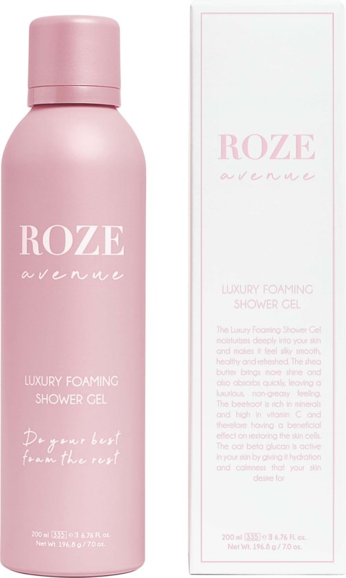 Een roze fles Roze Avenue luxe schuimende douchegel en de hoge witte doos met roze tekst.