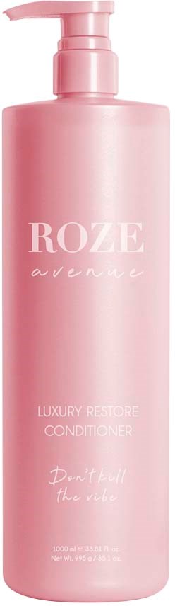 Eine rosa Flasche Luxus-Restore-Conditioner mit Pumpe, beschriftet "ROZE avenue" und den Worten "Don't call the class."