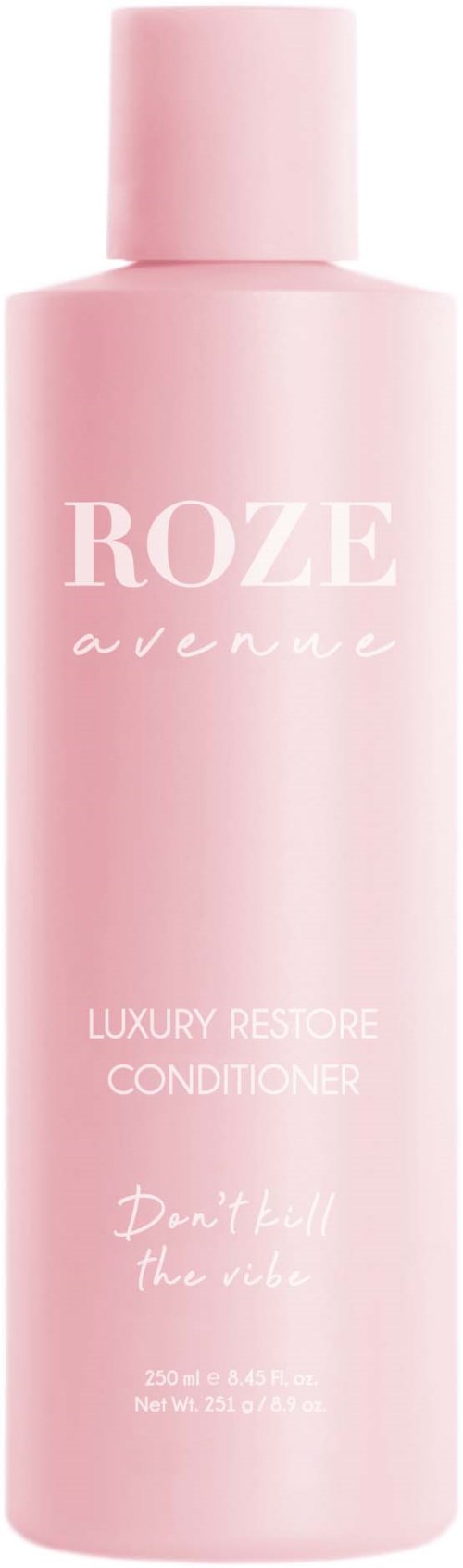 Eine rosa Flasche mit 'ROZE avenue' und 'Luxury Restore Conditioner'. Sie sagt 'Don't forget the names' und hat Volumenangaben.