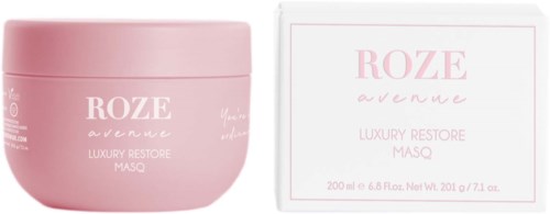 Rosa Dose und Verpackung mit weißen und rosa Labels für ein Luxus-Gesichtsmaske-Produkt.
