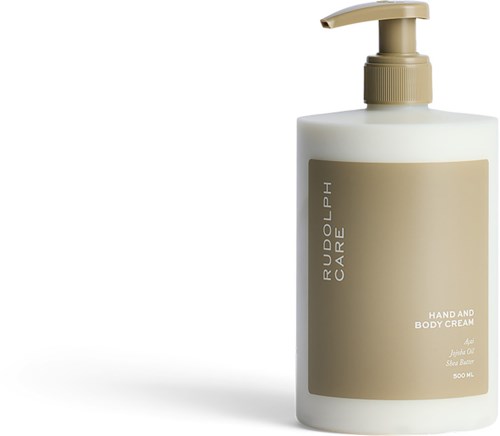 A bottle of RUDOLPH CARE hand and body cream with pump, 500 ml, beige label.