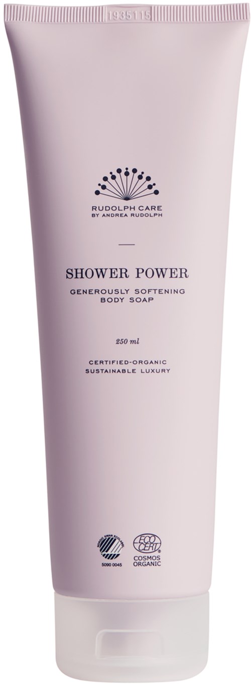 Pink tube of body soap labeled 'Shower Power' with certification symbols and a logo at the top.