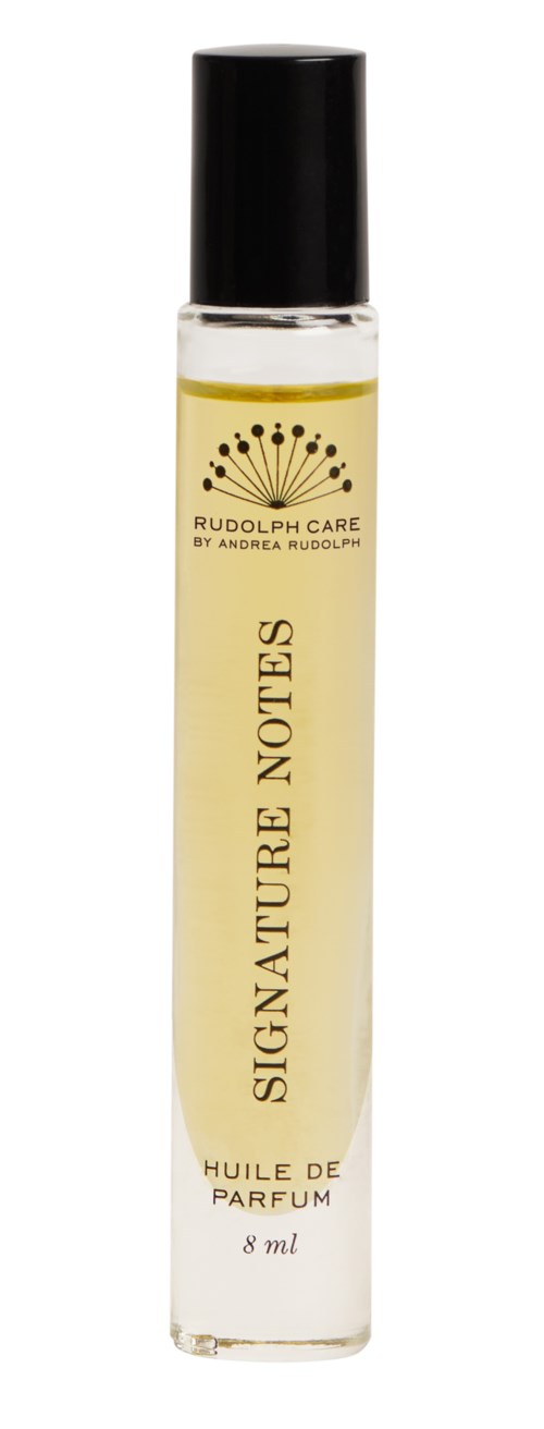 En liten parfymflaska med svart lock och en etikett som säger "Signature Notes" och "Huile de Parfum."