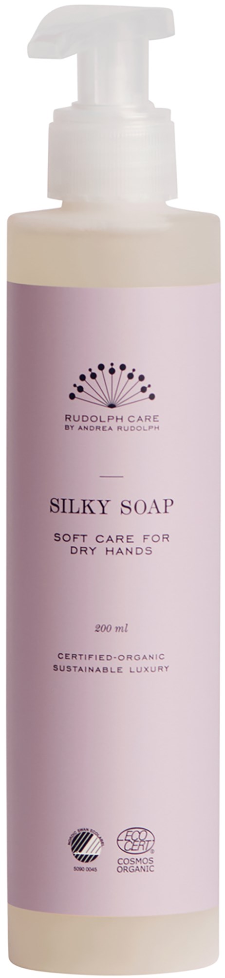 A bottle of silky soap for skin, with a pump top, pink label, and natural, organic certifications.