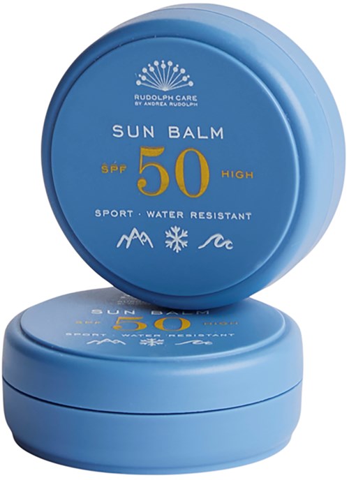 Blue round container with SPF 50 sun protection, water resistant, sport type, labeled Rudolph Care sun balm.