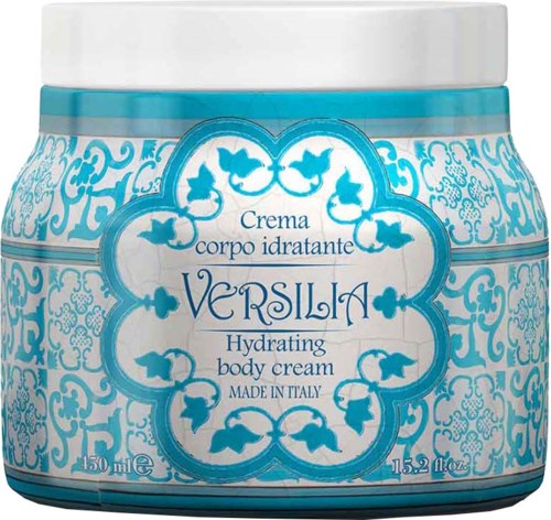 A blue and white jar of Versila hydrating body cream from Italy with a floral design and fish images.