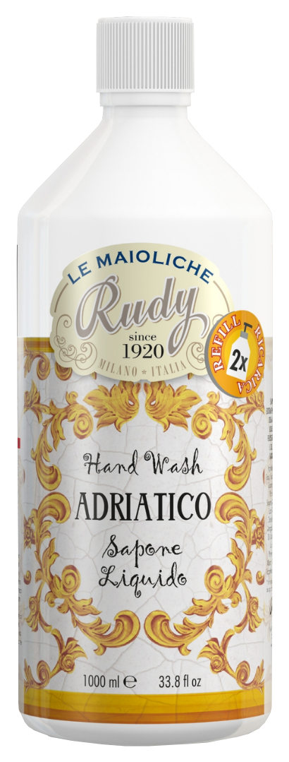 Valkoinen käsisaippalapullkopitserä ja kellertäviä kuvioita, etiketti 'Adriatico' ja 'Hand Wash'.
