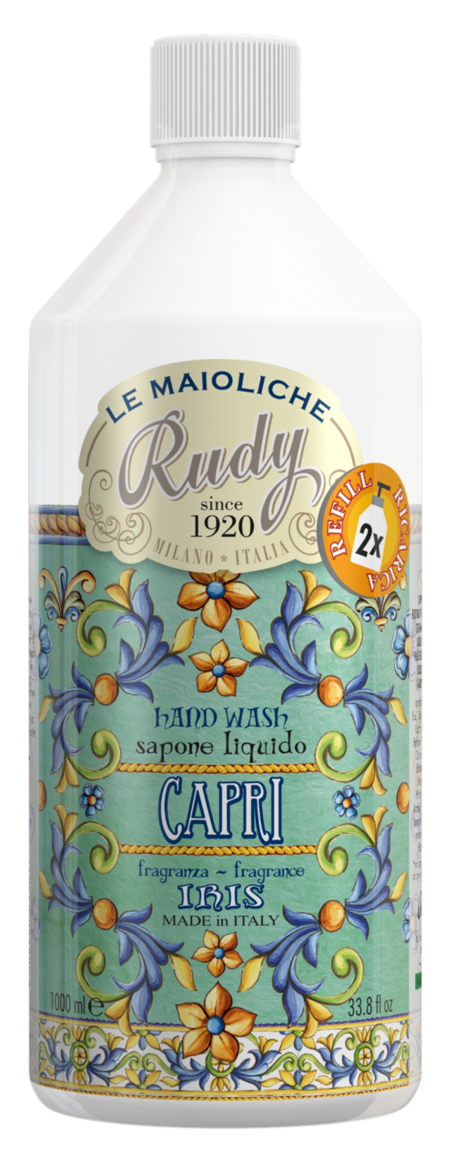 A white bottle with colorful floral designs, a white cap, and labels with blue and orange accents. It is a liquid soap.