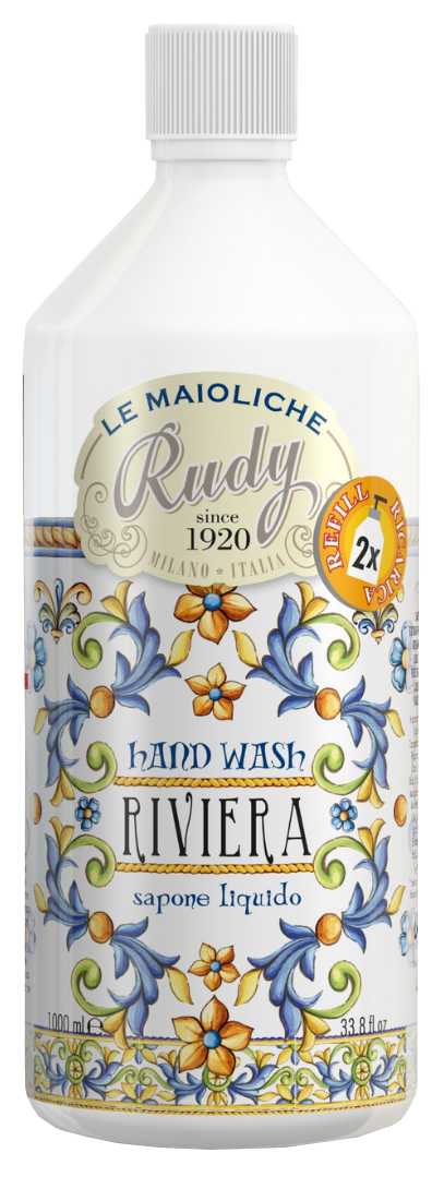A white bottle of liquid hand wash with decorative blue, yellow, and green floral patterns and text.