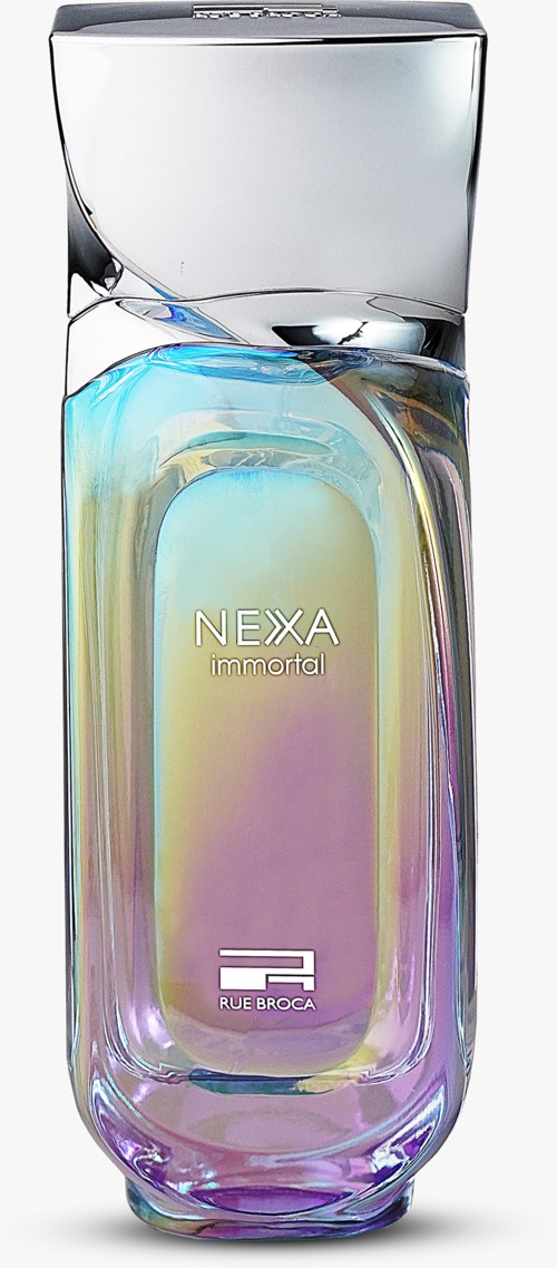 A tall, shiny, iridescent perfume bottle with a silver cap, labeled "NEXA immortal" and "RUE BROCA."