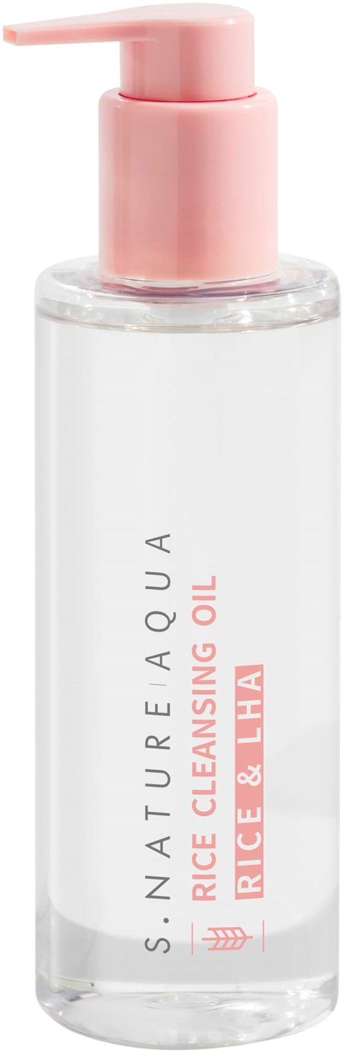 A clear bottle with a pink pump contains rice and lily cleansing oil. The label has black and pink text.