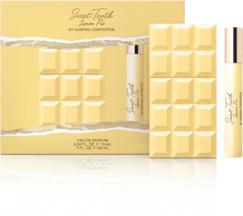 Gult chokladkakeformigt förpackning för Sweet Tooth Lemon Pie parfym och en matchande roll-on parfymflaska.