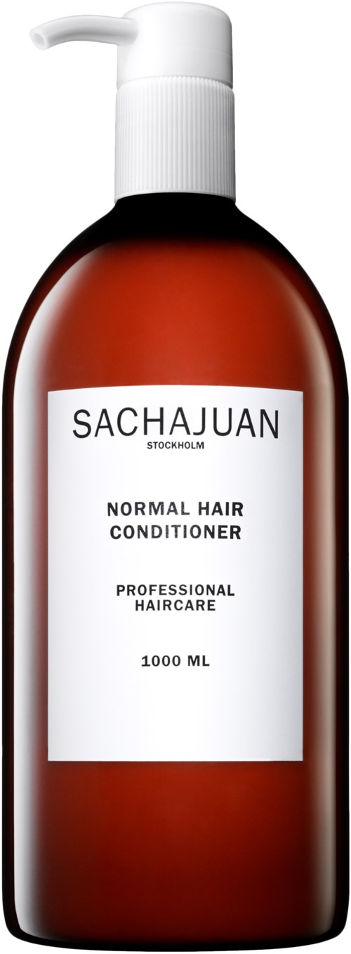 En brun flaska med Sachajuan normalt balsam med vit tapp, märkt som professionell hårvård, 1000 ml.