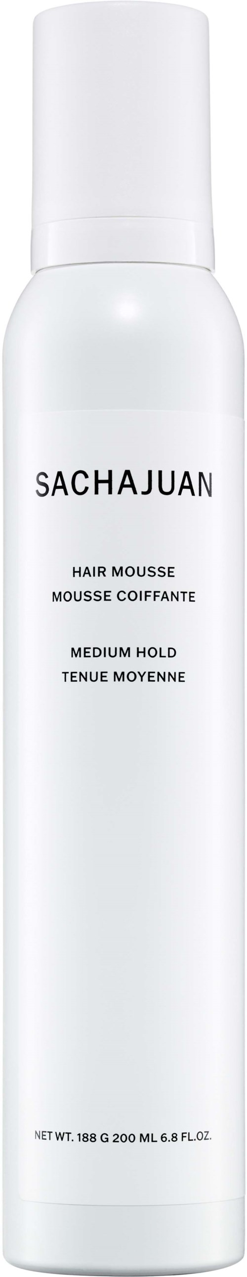 A white canister labeled "SACHAJUAN" with details about hair mousse for medium hold.