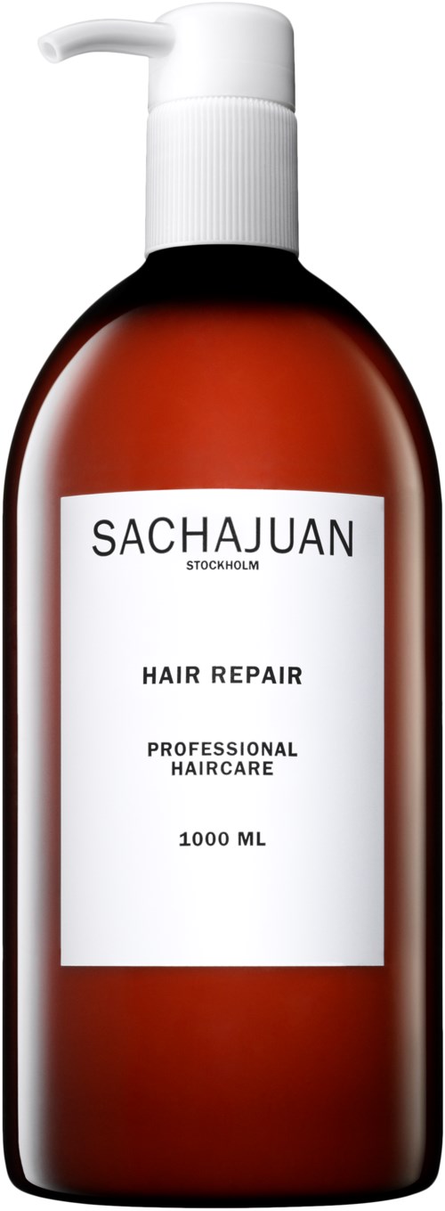 En brun flaska med vit pump, märkt Sachajuan Hair Repair, professionell hårvård, 1000 ml.